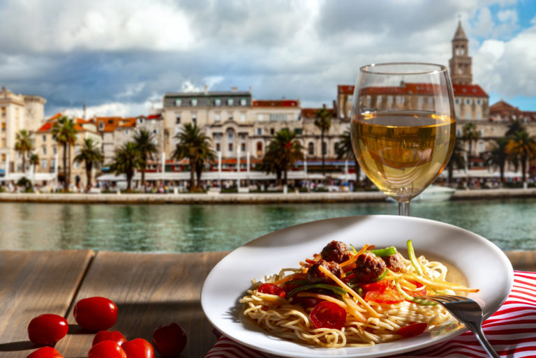 pasta-with-a-plate-of-sauce-on-the-table-in-croatia-split-2