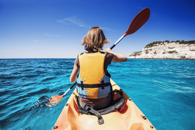 young-woman-with-kayak