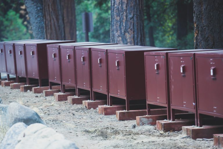 row-line-of-bear-proof-food-metal-storage-lockers-installed-near-camping-campground-in-yosemite-national-park-california-united-states-4